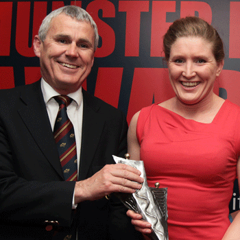 Heather O'Brien receives the Munster Womens Player of the Year Award 2012 from former Munster Rugby President John Hartery